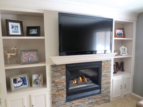Stone Fireplace Remodel with Built-In Shelves