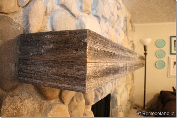 Wood Mantel on Stone Wall