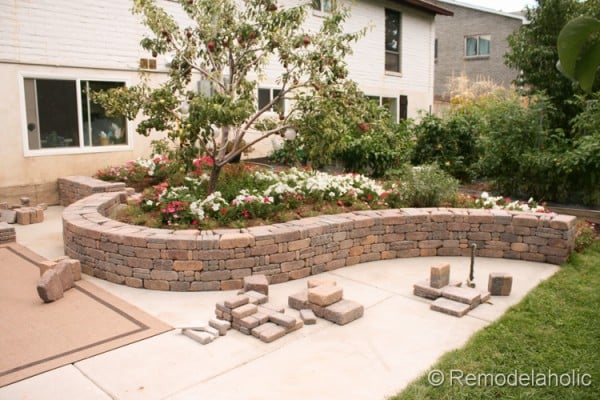 how to build a retaining wall with Rumblestone blocks from Remodelaholic