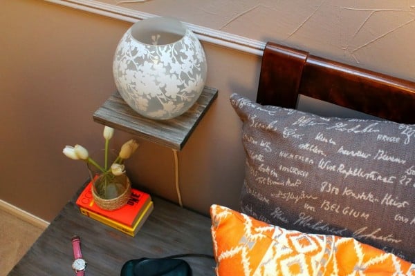 DIY bedside floating shelf with lamp, Turtles and Tails featured on Remodelaholic.com