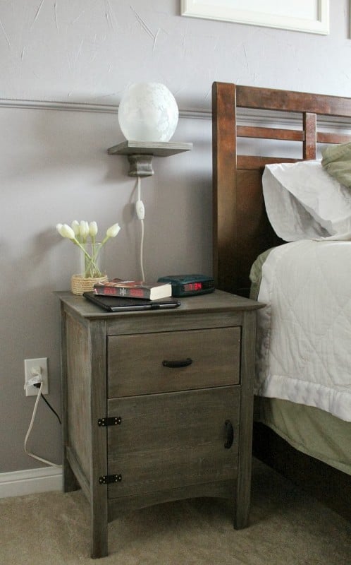 DIY floating bedside lamp shelf over nightstand, Turtles and Tails featured on Remodelaholic.com