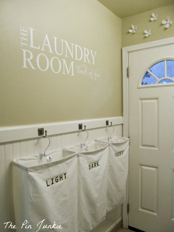 Laundry Room Makeover with Personalized Hanging Laundry Bags, The Pin Junkie featured on Remodelaholic.com