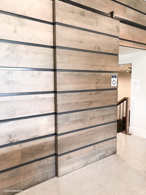 How to Decorate a Hallway and Hide a Barn Door