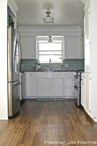 small white kitchen remodel, Fisherman's Wife Furniture featured on Remodelaholic.com