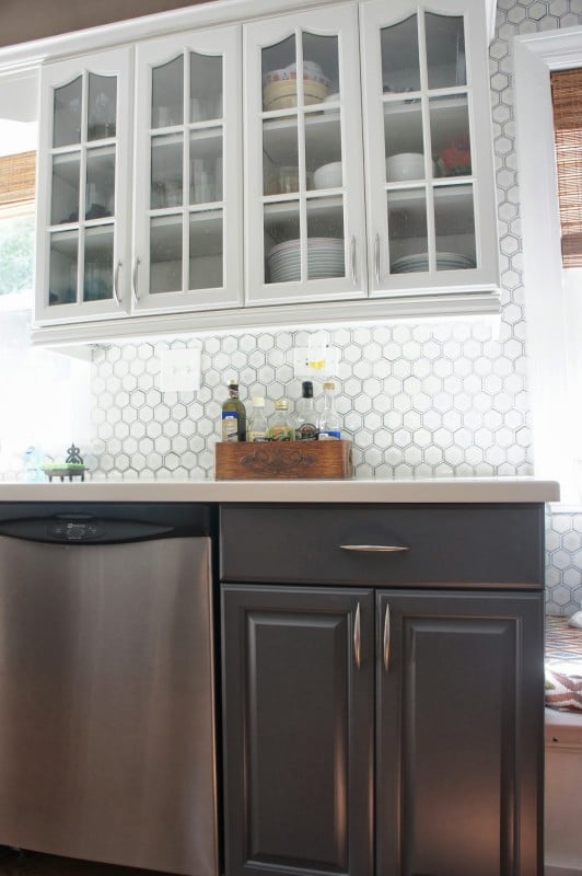 Two-Tone Gray and White Kitchen Makeover | LoveLee Homemaker featured on Remodelaholic.com #paintedcabinets #grayandwhite #kitchenmakeover