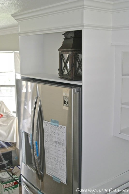 white painted fridge enclosure and fur down, Fisherman's Wife Furniture featured on Remodelaholic.com