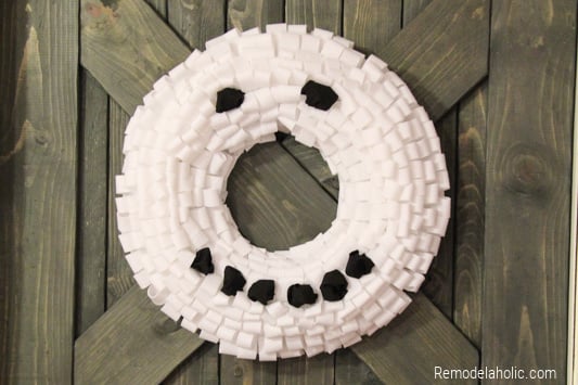 Tutorial For Making A Snowman Wreath for winter decoration From Remodelaholic
