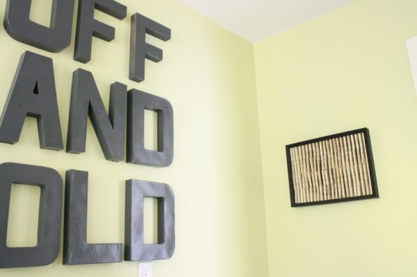low cost laundry room wall decor, featured on Remodelaholic