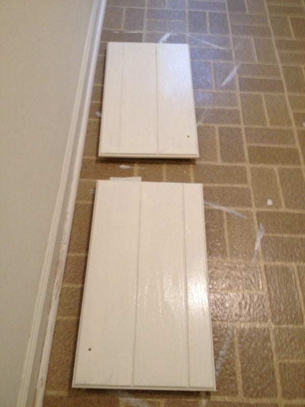 painting laundry room cabinet doors, featured on Remodelaholic