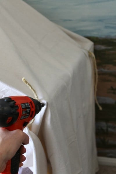 use screws to attach canvas to dowels for indoor camping tent bed, The Ragged Wren on Remodelaholic
