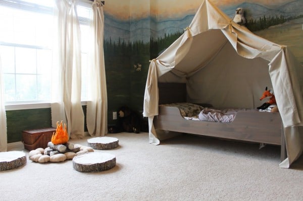 woodland themed kids room with camping tent bed and play campfire, The Ragged Wren on Remodelaholic
