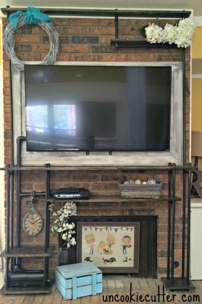 pvc industrial pipe shelves to hide TV cords - Uncookie Cutter
