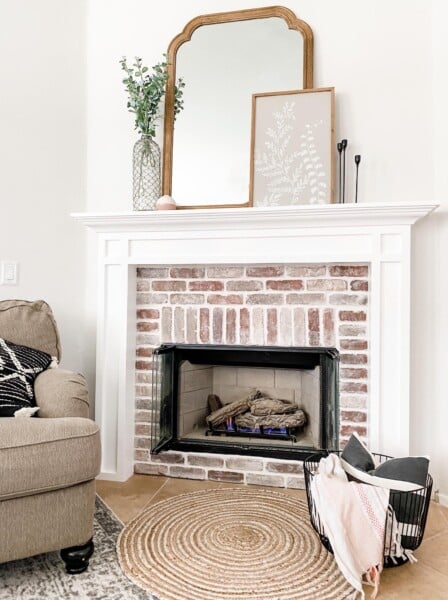 DIY Brick Fireplace And White Mantel, Living In Laundry Featured On Remodelaholic