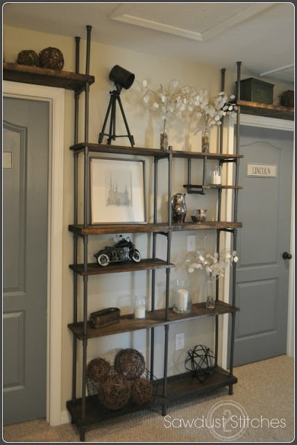 finished-vintage-industrial-shelf-made-with-inexpensive-PVC-pipe-Sawdust-2-Stitches-on-Remodelaholic