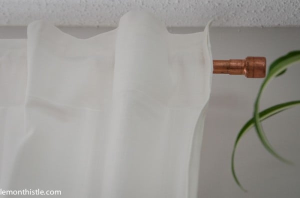 upcycled copper pipe curtain rod and finial, Lemon Thistle on Remodelaholic
