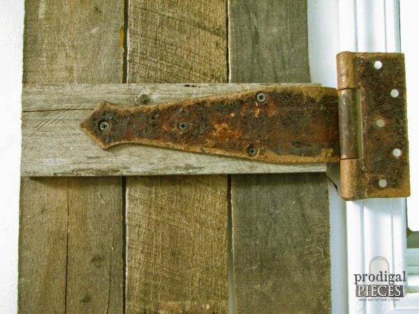 weathered rusty hinge on interior barnwood shutter made from pallets, Prodigal Pieces on Remodelaholic
