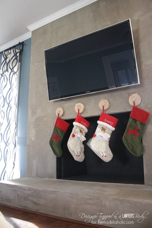 You can hang stockings without a mantel, by Designer Trapped in a Lawyer's Body featured on Remodelaholic